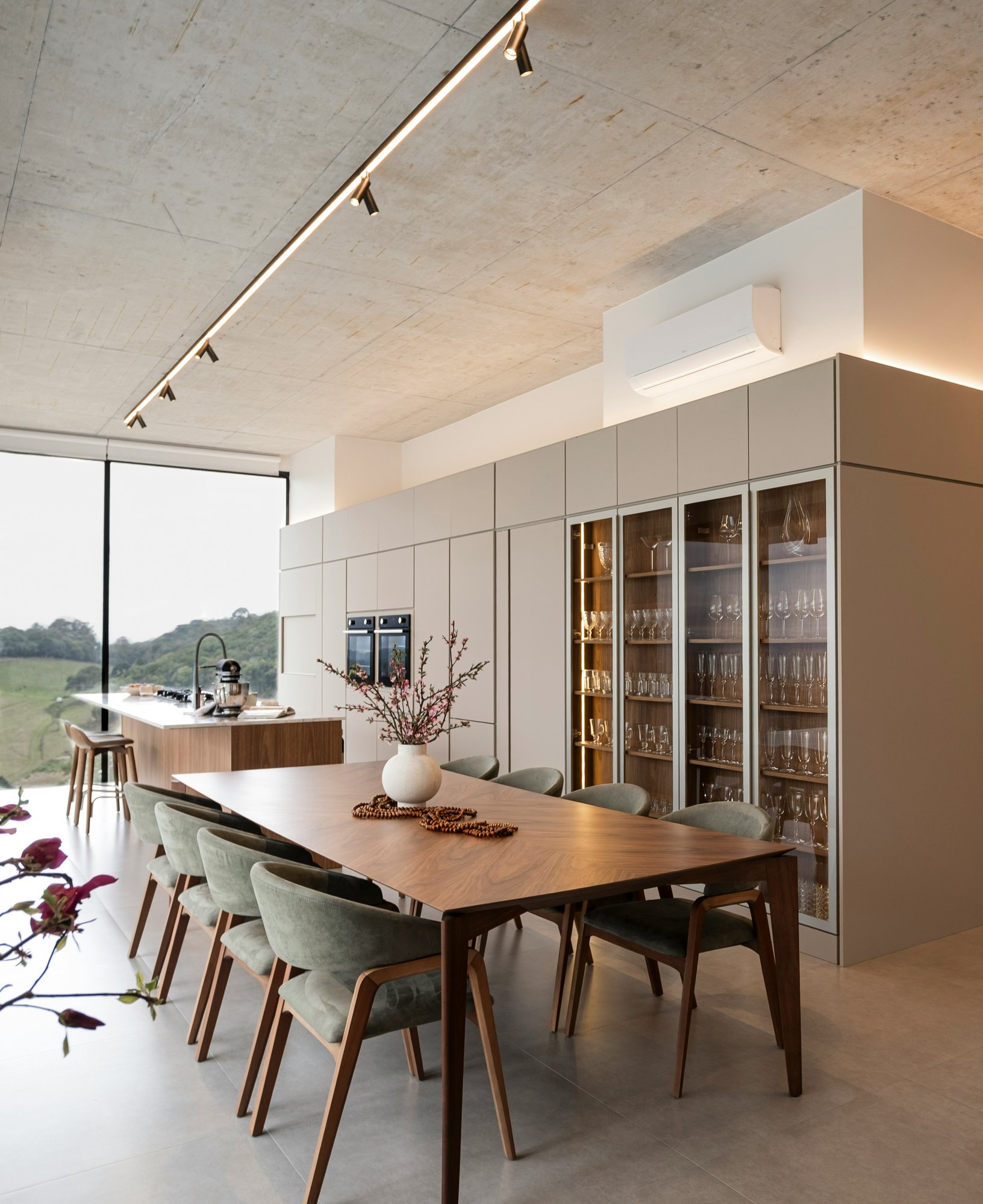 Interior kitchen with table, chairs, and a large window